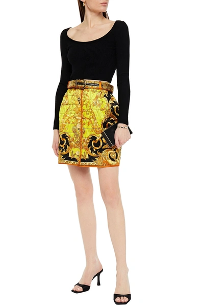 Shop Versace Leather-trimmed Quilted Printed Silk-satin Mini Skirt In Yellow