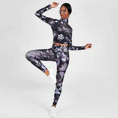 Puma Women's Evide Allover Print Leggings Size X-small Polyester In Elektro  Purple/dark Dream