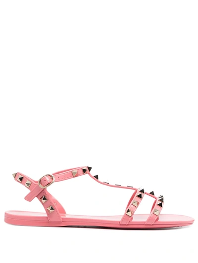 Shop Valentino Rockstud Flat Sandals In Pink