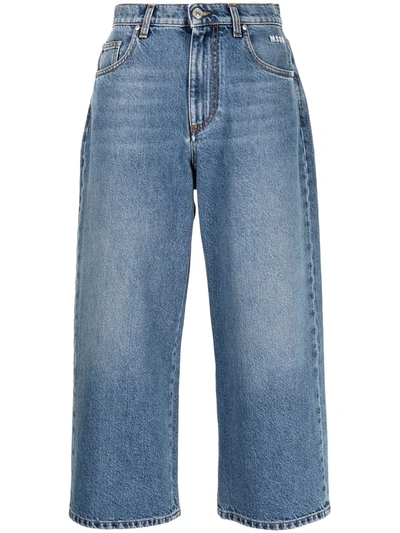 Shop Msgm Logo-print Cropped Jeans In Blue