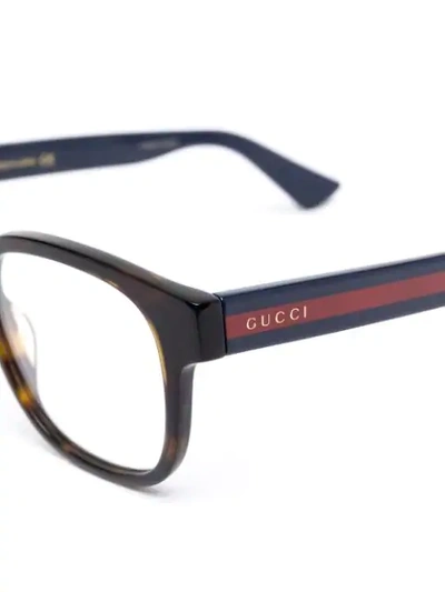 Shop Gucci Tortoiseshell Round-frame Glasses In Brown