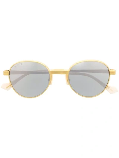 Shop Gucci Round-frame Sunglasses In Gold