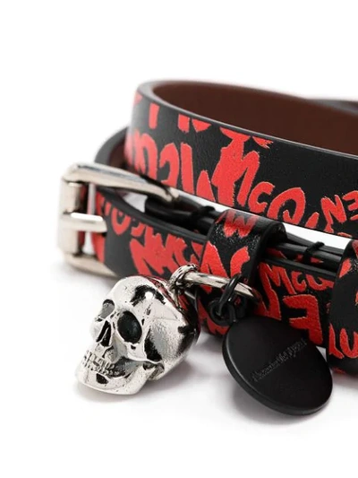 Shop Alexander Mcqueen Skull Graffiti Print Bracelet In Black