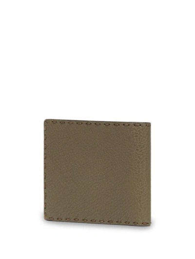 Shop Fendi Logo Embossed Bi-fold Wallet In Green