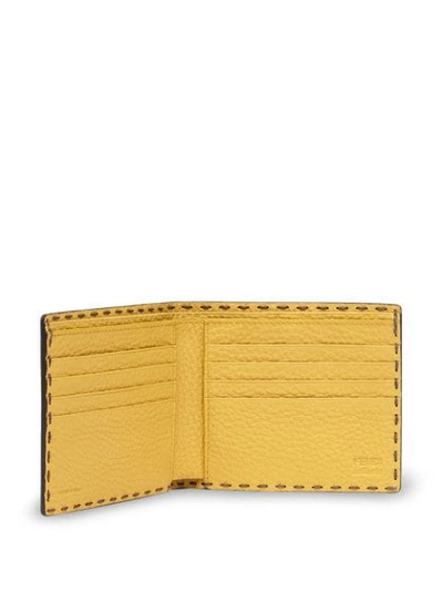 Shop Fendi Logo Embossed Bi-fold Wallet In Green