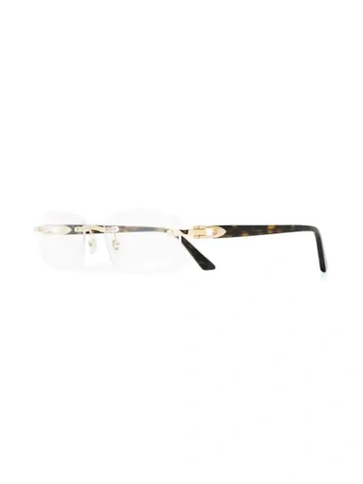 Shop Cartier Ct0287o Rimless Glasses In Brown