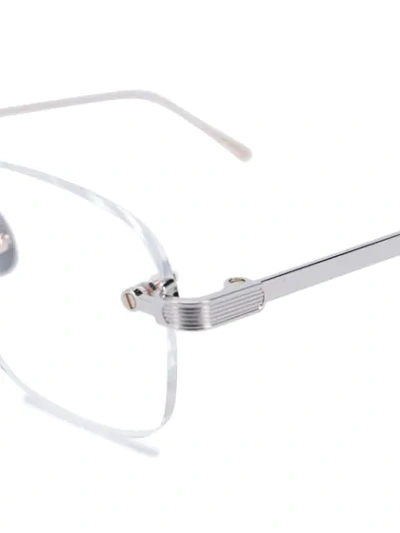 Shop Cartier Thin Frame Glasses In Silver