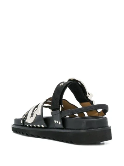 Toga Sandales Plates En Cuir Noir Avec Détails Métallisés In Black