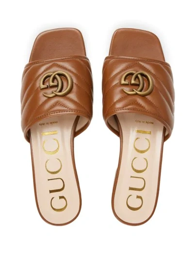 Shop Gucci Double G Quilted Mules In Brown