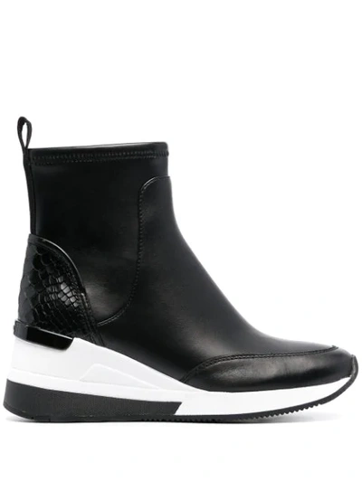 Shop Michael Michael Kors Skyler Leather Wedge Sneakers In Black