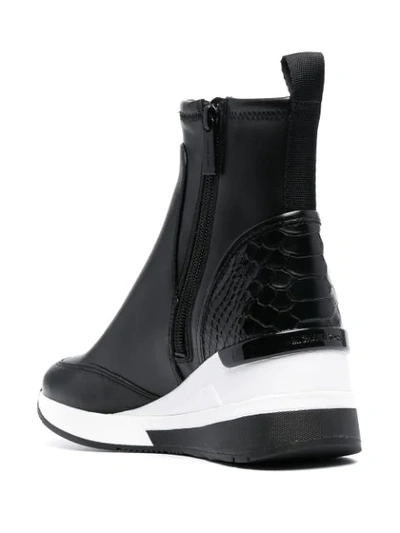 Shop Michael Michael Kors Skyler Leather Wedge Sneakers In Black