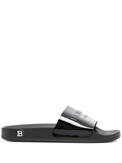 Shop Balmain Embossed Logo Slide Sandals In 0pa Black