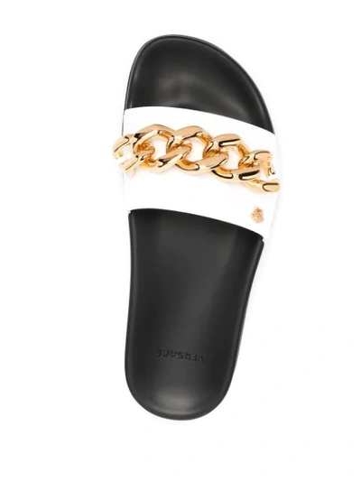 Shop Versace Chain-embellished Medusa Slides In White