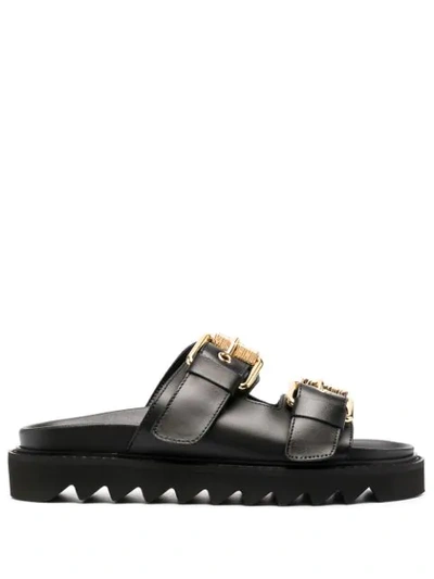 Shop Moschino Logo Plaque Buckled Sandals In Black