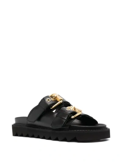 Shop Moschino Logo Plaque Buckled Sandals In Black