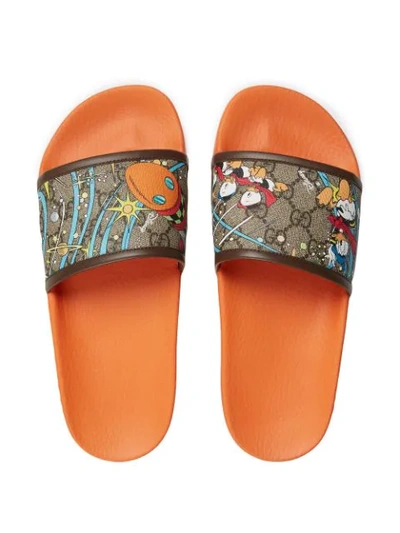 Shop Gucci X Disney Donald Duck Slides In Brown