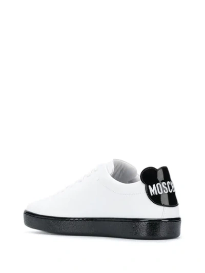 Shop Moschino Logo Print Low-top Sneakers In White