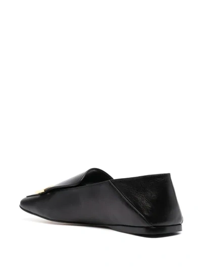 Shop Sergio Rossi Metal-plaque Leather Loafers In Black