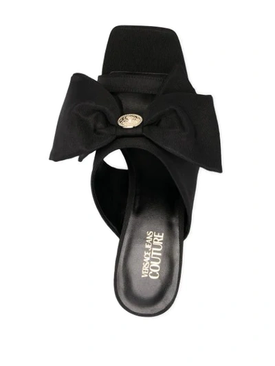 Shop Versace Jeans Couture Bow Mule Sandals In Black
