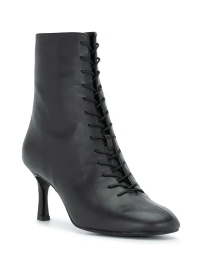 Shop Reformation 35mm Natalia Ankle Boots In Black