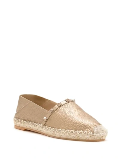 Shop Valentino Rockstud Flat Espadrilles In Gold