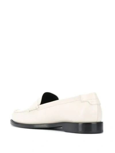 Shop Saint Laurent Monogram Plaque Loafers In White