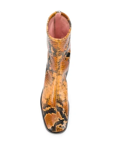 Shop Acne Studios Python Print Ankle Boots In Orange