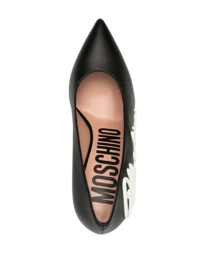 Shop Moschino Raised Logo Detail Pumps In Black