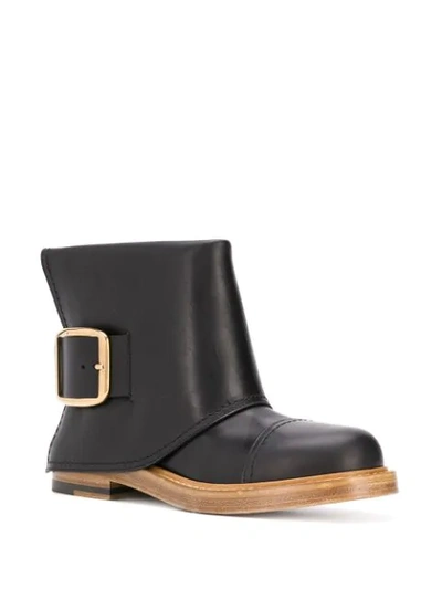 Shop Alexander Mcqueen Buckle-detail Ankle Boots In Black