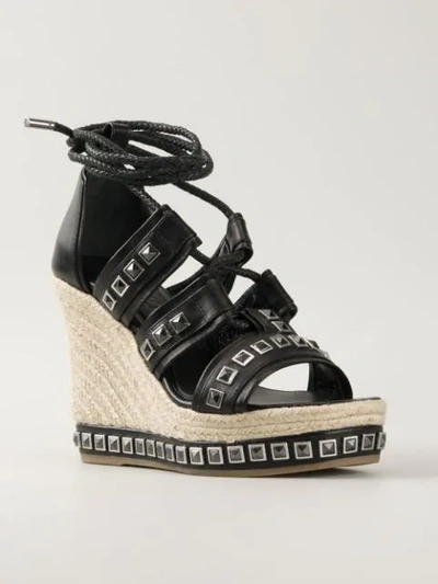 Shop Alexander Mcqueen Studded Wedge Sandals In Black