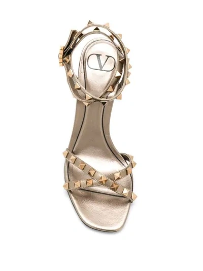 Shop Valentino Rockstud 85mm Sandals In Gold