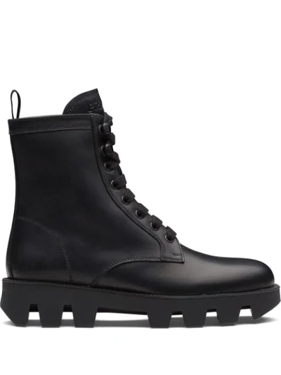 Shop Prada Calf Leather Laced Booties In Black