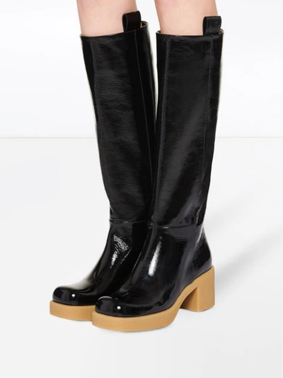 Shop Miu Miu Pull-tab Knee-high Boots In Black