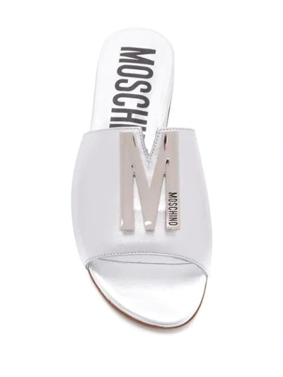 Shop Moschino M Plaque Slide Sandals In Silver