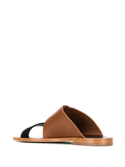 Shop Ferragamo Gancini Flat Sandals In Black