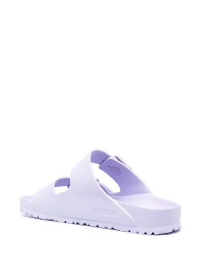 Shop Birkenstock Arizona Buckle Slides In Purple