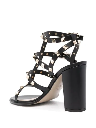 Shop Valentino Rockstud Strappy Sandals In Black