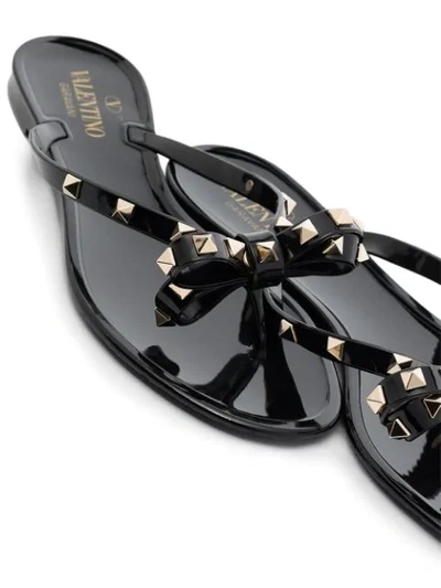 Shop Valentino Rockstud Bow-detail Sandals In Black