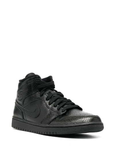 Shop Jordan Air  1 Mid Sneakers In Black