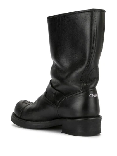 Pre-owned Chanel Cc Stitch Buckled Boots In Black