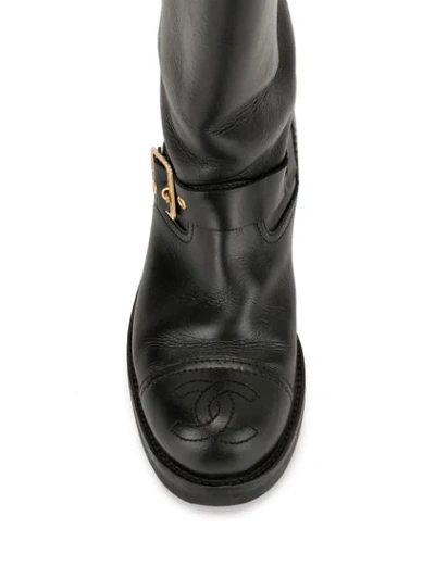 Pre-owned Chanel Cc Stitch Buckled Boots In Black