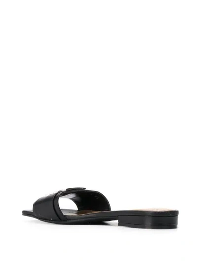 Shop Sergio Rossi Logo Plaque Low Heel Sandals In Black