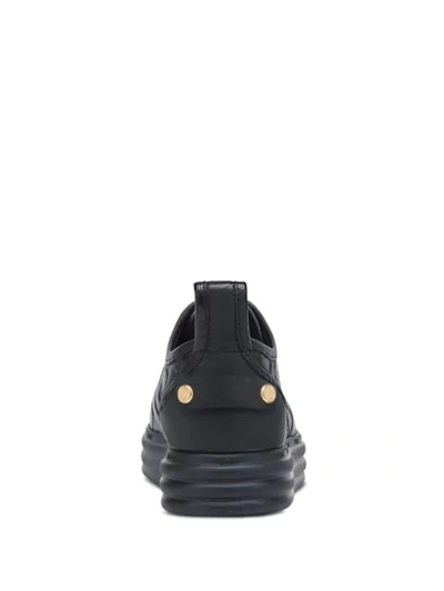 Shop Fendi Ff Embossed Sneakers In Black