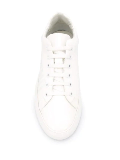 Shop Moschino Logo Print Sneakers In White