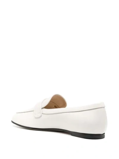 Shop Tod's T-logo Almond Toe Loafers In White