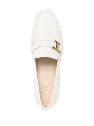 Shop Tod's T-logo Almond Toe Loafers In White