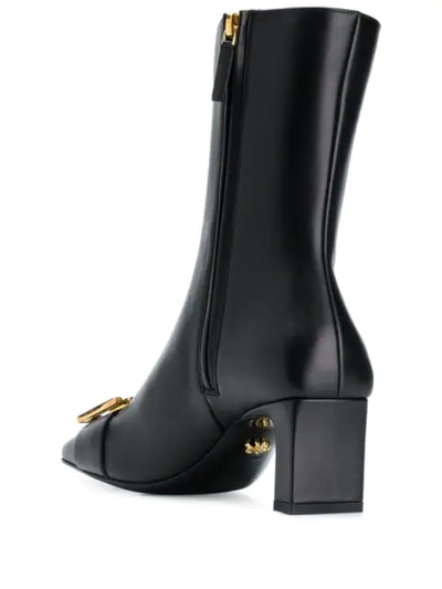 Shop Versace Greca 60 Mm Buckle Leather Ankle Boots In Black