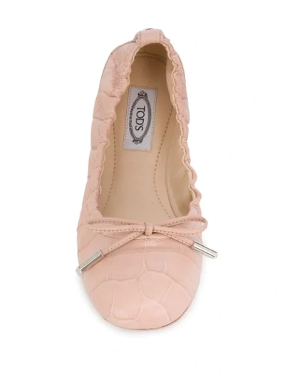 Shop Tod's Ruched Ballerina Shoes In Pink