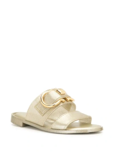 Shop Ferragamo Gancini Metallic Flat Sandals In Gold