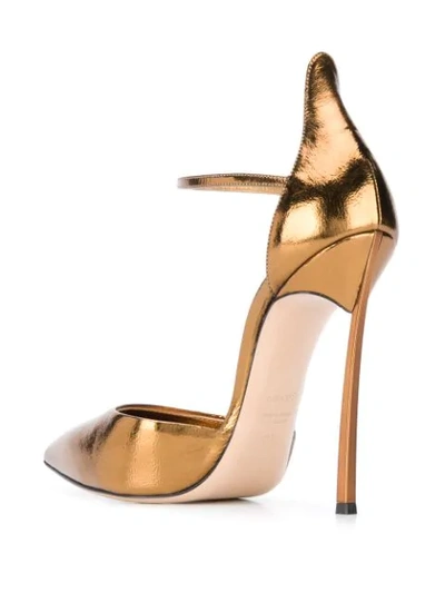 Shop Casadei Visio Pumps In Gold